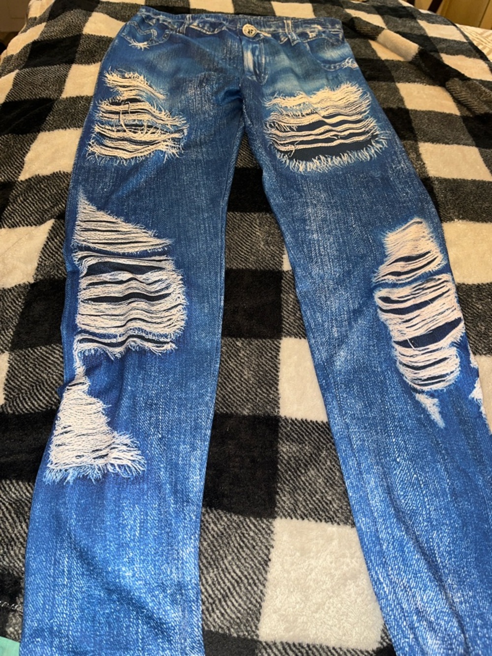 Ladies  jeggings  the look of torn Jeans